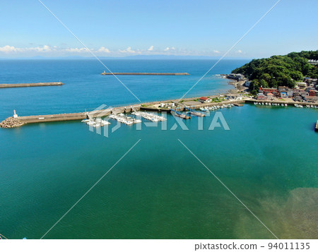 Aerial view of rustic harbor scenery of Motegi fishing port in Nagasaki city Aerial view of rustic harbor scenery of Motegi fishing port in Nagasaki city 94011135