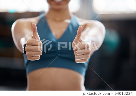 Woman, fitness and thumbs up to health, workout and training to live an active, wellness and healthy lifestyle with gym. Personal trainer, yes and thank you for positive energy in our sports club Woman, fitness and thumbs up to health, workout and training to live an active, wellness and healthy lifestyle with gym. Personal trainer, yes and thank you for positive energy in our sports club 94013224