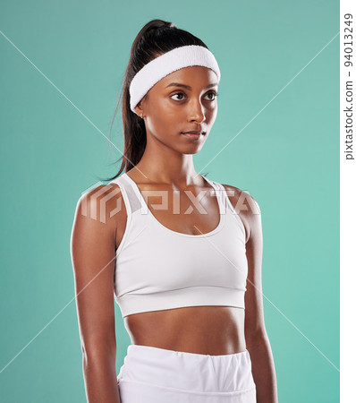 Black female tennis, badminton or squash player standing, relax and cool before competition, tournament and game or match. Athletic and fit African American sports woman with professional sportswear Black female tennis, badminton or squash player standing, relax and cool before competition, tournament and game or match. Athletic and fit African American sports woman with professional sportswear 94013249