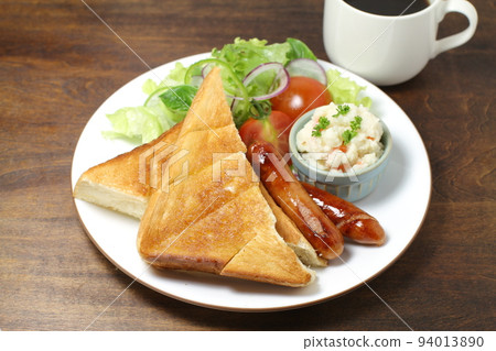 One plate of toast and salad and coffee One plate of toast and salad and coffee 94013890
