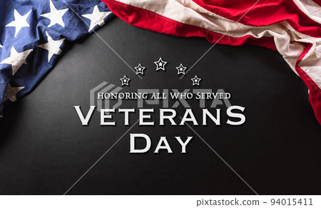 Happy Veterans day concept made from American flag and the text on dark wooden background. 94015411