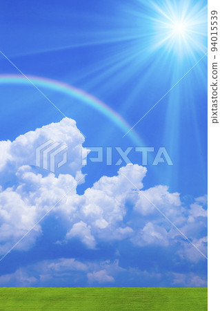 Rainbow and sun on meadow and blue sky Rainbow and sun on meadow and blue sky 94015539