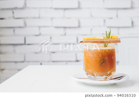 The passion fruit Mocktail serving on white table with isolated white background. The passion fruit Mocktail serving on white table with isolated white background. 94016310