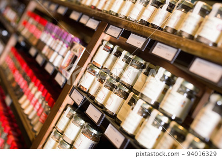 Spices in glass jars at store Spices in glass jars at store 94016329