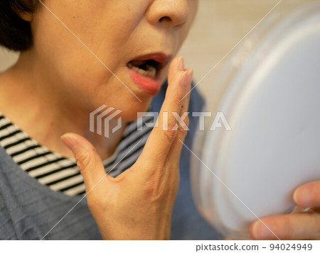 Mouth troubles of elderly women Mouth troubles of elderly women 94024949