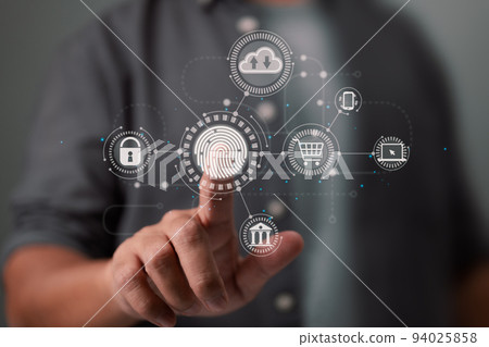 The businessman's fingerprint scan offers secure interface for online payments, banking, and cloud computing network connections. 94025858