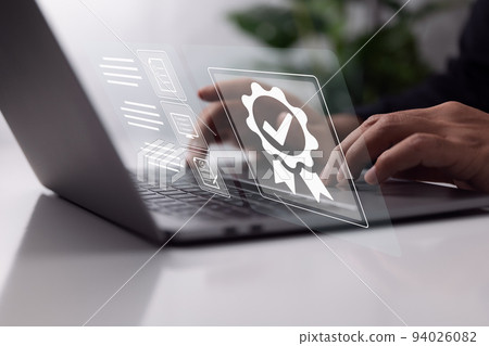 Businessman dealing with the quality assurance, guarantee, standards, ISO certification, and standardization idea. Businessman dealing with the quality assurance, guarantee, standards, ISO certification, and standardization idea. 94026082