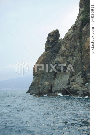 Rocks clif mountains sea, place near resort town Gurzuf. southern coast of the Black Sea, Crimea 94026911