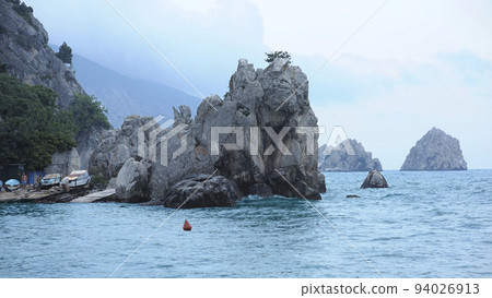 Rocks clif mountains sea, place near resort town Gurzuf. southern coast of the Black Sea, Crimea Rocks clif mountains sea, place near resort town Gurzuf. southern coast of the Black Sea, Crimea 94026913