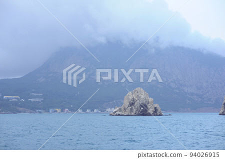 Rocks clif mountains sea, place near resort town Gurzuf. southern coast of the Black Sea, Crimea 94026915
