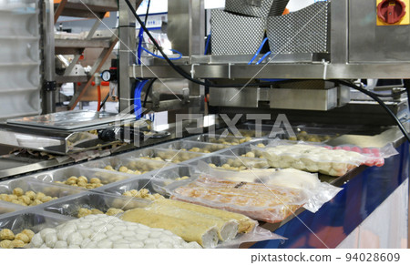 Automatic meatballs, pork, slices fresh meat, food production line on conveyor belt equipment machinery in factory, industrial food production Automatic meatballs, pork, slices fresh meat, food production line on conveyor belt equipment machinery in factory, industrial food production 94028609