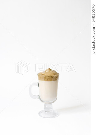 Dalgon's trending drink is coffee. Coffee mug in clear glass on a white background Dalgon's trending drink is coffee. Coffee mug in clear glass on a white background 94030570