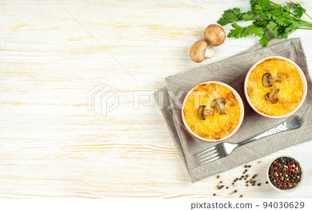French Julienne casserole with chicken and mushroom in portion ramekin on white background French Julienne casserole with chicken and mushroom in portion ramekin on white background 94030629