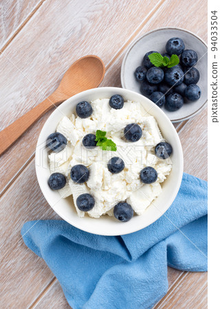 Tvorog, cottage cheese with blueberries Tvorog, cottage cheese with blueberries 94033504