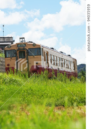 Blue sky, countryside and Kominato Railway 94035959