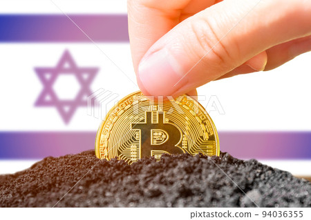 Legalization of bitcoins in Israel. Planting a Bitcoin in the ground against the background of the flag of Israel. Israel - investment in cryptocurrency. Legalization of bitcoins in Israel. Planting a Bitcoin in the ground against the background of the flag of Israel. Israel - investment in cryptocurrency. 94036355
