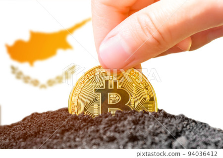 Legalization of bitcoins in Cyprus. Planting Bitcoin in the ground on the background of the flag of Cyprus. Cyprus - investment in cryptocurrency. Legalization of bitcoins in Cyprus. Planting Bitcoin in the ground on the background of the flag of Cyprus. Cyprus - investment in cryptocurrency. 94036412