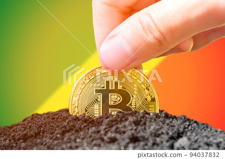 Legalization of bitcoin in the Republic of the Congo. Planting bitcoin in the ground on the background of the flag Congo. Republic of the Congo - investment in cryptocurrency Legalization of bitcoin in the Republic of the Congo. Planting bitcoin in the ground on the background of the flag Congo. Republic of the Congo - investment in cryptocurrency 94037832