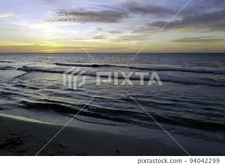 Dramatic sunset over the Cuban beach 94042299
