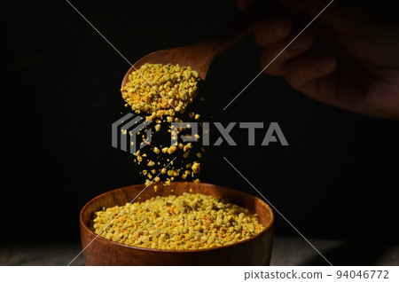 Raw Amorphous Pollen On A Wooden Spoon Raw Amorphous Pollen On A Wooden Spoon 94046772