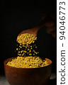 Raw Amorphous Pollen On A Wooden Spoon 94046773