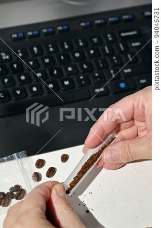 Addiction Making A Homemade Cigarette Using Grinded Coffee And Paper Addiction Making A Homemade Cigarette Using Grinded Coffee And Paper 94046781