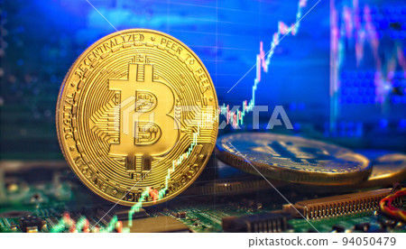 Blockchain technology bitcoin mining concept. Bitcoin golden coin on computer circuit board. banner copy space Blockchain technology bitcoin mining concept. Bitcoin golden coin on computer circuit board. banner copy space 94050479