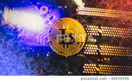 Cryptocurrency concept , Golden bitcoin on mainboard , The future of money. Computational equipment. 94050499
