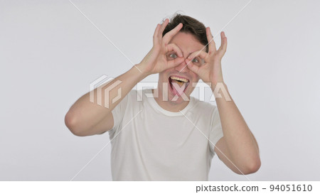 Funny Young Man with Binocular Gesture Searching on White Background 94051610