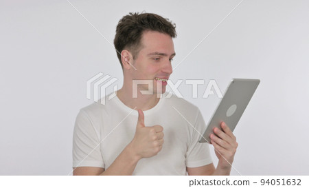 Video Call on Tablet by Young Man on White Background 94051632