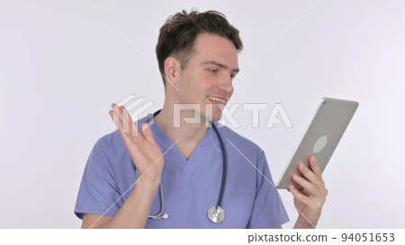 Video Chat on Tablet by Young Doctor on White Background Video Chat on Tablet by Young Doctor on White Background 94051653
