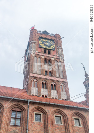 Clock Tower of city hall building in Torun, Poland. 94052035