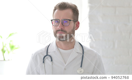Portrait of Doctor Showing No Sign by Finger, Denial 94052768