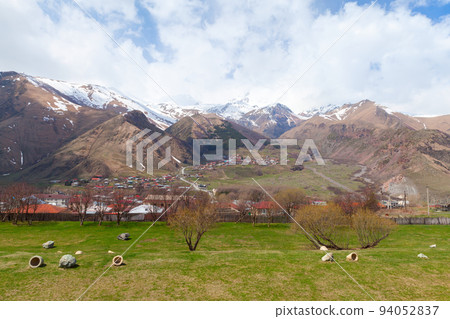 Stepantsminda landscape with Kazbegi mountains Stepantsminda landscape with Kazbegi mountains 94052837