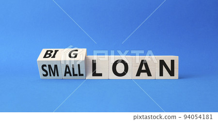 Big loan and Small loan symbol. Turned cubes with words Small loan and Big loan. Beautiful blue background. Busines concept. Copy space Big loan and Small loan symbol. Turned cubes with words Small loan and Big loan. Beautiful blue background. Busines concept. Copy space 94054181