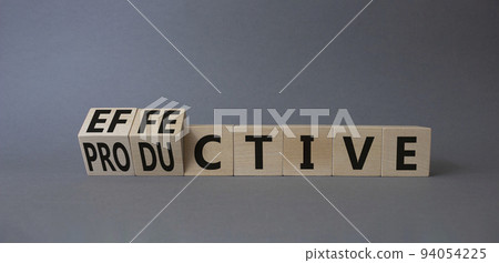 Effective and Productive symbol. Turned cubes with words Productive and Effective. Beautiful grey background. Business and Effective and Productive concept. Copy space Effective and Productive symbol. Turned cubes with words Productive and Effective. Beautiful grey background. Business and Effective and Productive concept. Copy space 94054225