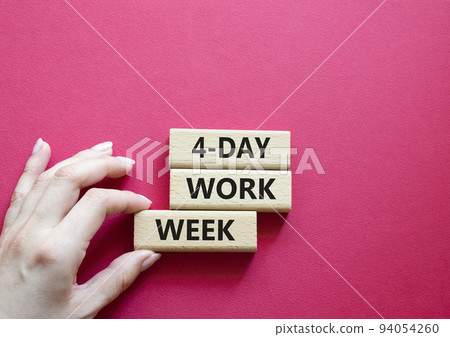 4-day work week symbol. Concept words 4-day work week on wooden blocks. Beautiful red background. Businessman hand. Business and 4-day work week concept. Copy space 4-day work week symbol. Concept words 4-day work week on wooden blocks. Beautiful red background. Businessman hand. Business and 4-day work week concept. Copy space 94054260