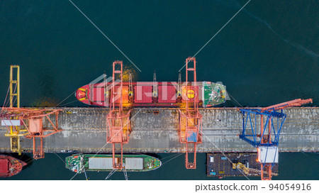 Aerial top view large general cargo ship bulk carrier, Bulk carrier dock, Global business import export logistic and transportation company, Commercial dock container cargo vessel freight shipping Aerial top view large general cargo ship bulk carrier, Bulk carrier dock, Global business import export logistic and transportation company, Commercial dock container cargo vessel freight shipping 94054916