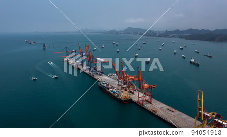 Aerial view bulk carrier dock, Global business import export logistic and transportation company, Commercial dock container cargo vessel freight shipping worldwide. Aerial view bulk carrier dock, Global business import export logistic and transportation company, Commercial dock container cargo vessel freight shipping worldwide. 94054918