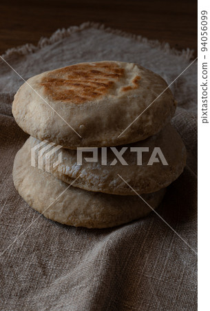Stack of Portuguese breads Bolo Do Caco. Stack of Portuguese breads Bolo Do Caco. 94056099