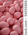 beauty background a bunch of pink gentle makeup sponges vertical orientation 94056866