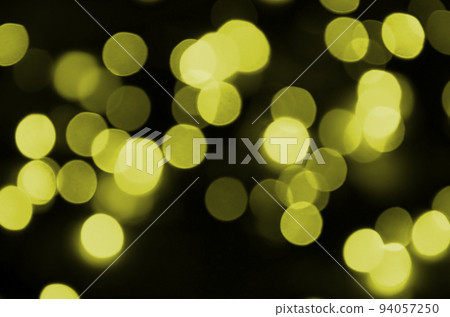 Bokeh effect golden yellow defocused light background. Christmas Lights Concept 94057250