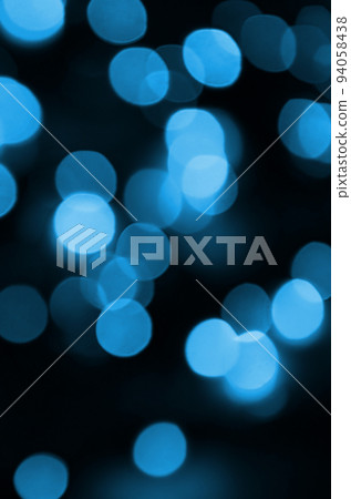Blue Festive Christmas elegant abstract background with many bokeh lights. Defocused artistic image Blue Festive Christmas elegant abstract background with many bokeh lights. Defocused artistic image 94058438