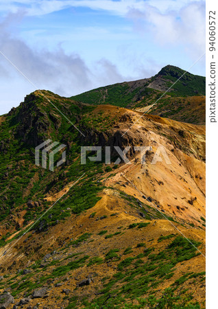 A superb view of the mountain range leading to Mt. Adatara and Yahazumori in summer 94060572