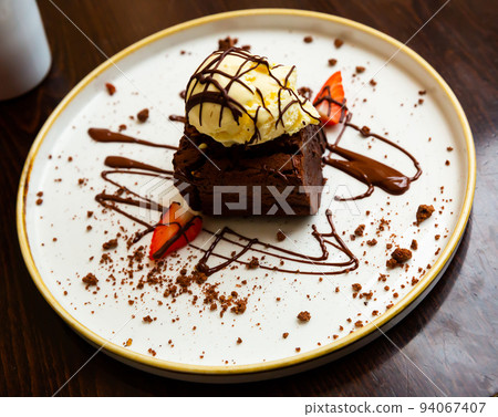 Sweet traditional chocolate brownie cake 94067407