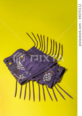 Purple felted wool scarf on a yellow background 94070112