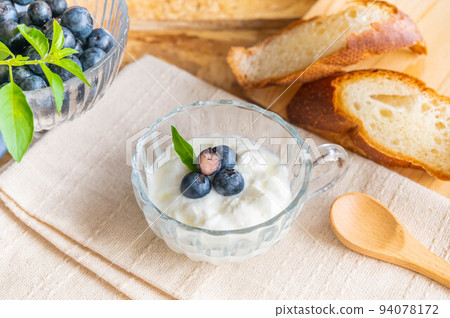 blueberries and yogurt for breakfast blueberries and yogurt for breakfast 94078172