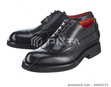 Elegant pair of men's derby shoes made of glossy black leather, lace-up, with beautiful highlights on the surface, isolated on a white background. Elegant pair of men's derby shoes made of glossy black leather, lace-up, with beautiful highlights on the surface, isolated on a white background. 94080153