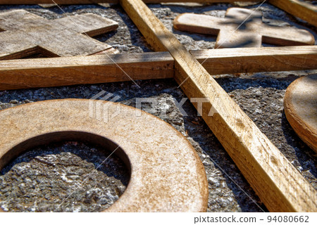 Textured wooden tic-tac-toe game 94080662