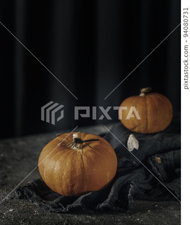 Orange Halloween pumpkins with insects on dark background. holiday decoration Orange Halloween pumpkins with insects on dark background. holiday decoration 94080731